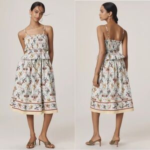 Anthropologie Smocked Peplum Midi Dress with yellow trim. Lined. 100% cotton